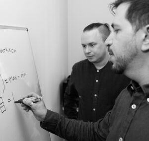 Meeting by the whiteboard